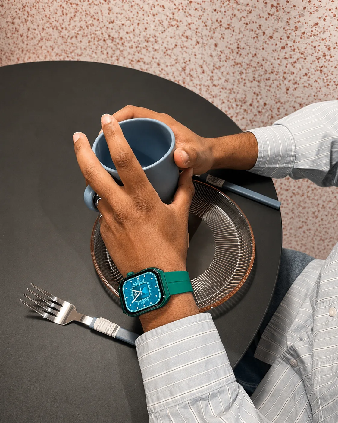 Green M² Watch editorial — top-down